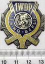 Odznaka 1WDP 1 Oficerska Szkoła Artylerii