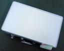 1. Aluminiowy kuferek na palety, monety Leuchtturm